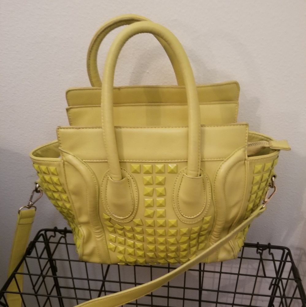 Studded yellow handbag